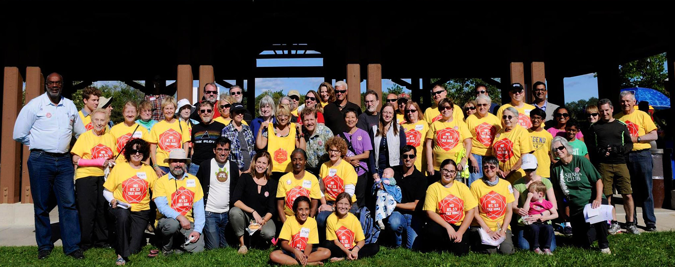 About sixty supporters, most in yellow No Rt. 53 Tax Hike T-shirts, gathered in front of a park pavilion